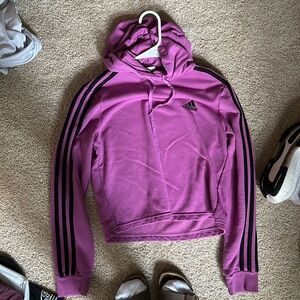 An Adidas light weight hoodoe